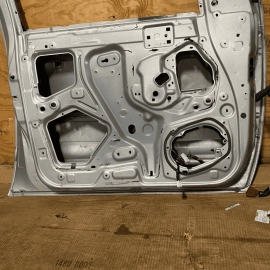2005-2012 NISSAN XTERRA FRONTIER FRONT LEFT DRIVER DOOR SHELL SILVER OEM 