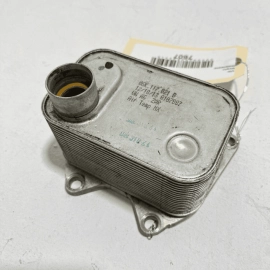 2012-2019 VOLKSWAGEN PASSAT JETTA ENGINE OIL COOLER 06K117021B OEM