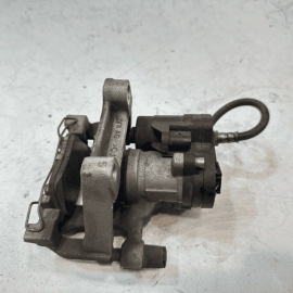 2021 Volkswagen Atlas Rear Left Caliper w/Support & w/Parking Brake Actuator OEM