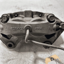 2014-2020 Infiniti Q50 AWD Front Passenger Side Akebono Brake Caliper OEM Silver