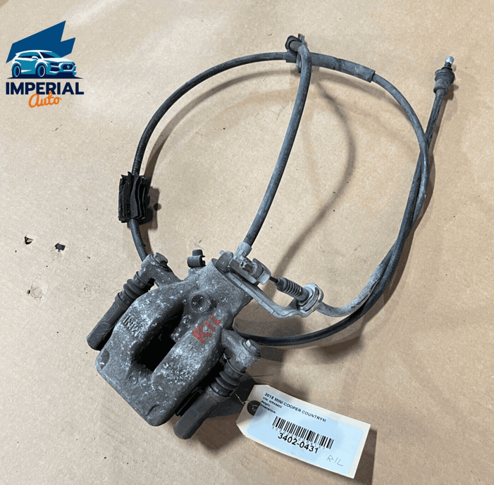 2011-2016 MINI COOPER COUNTRYMAN REAR LEFT SIDE BRAKE CALIPER W/ PAD OEM TR