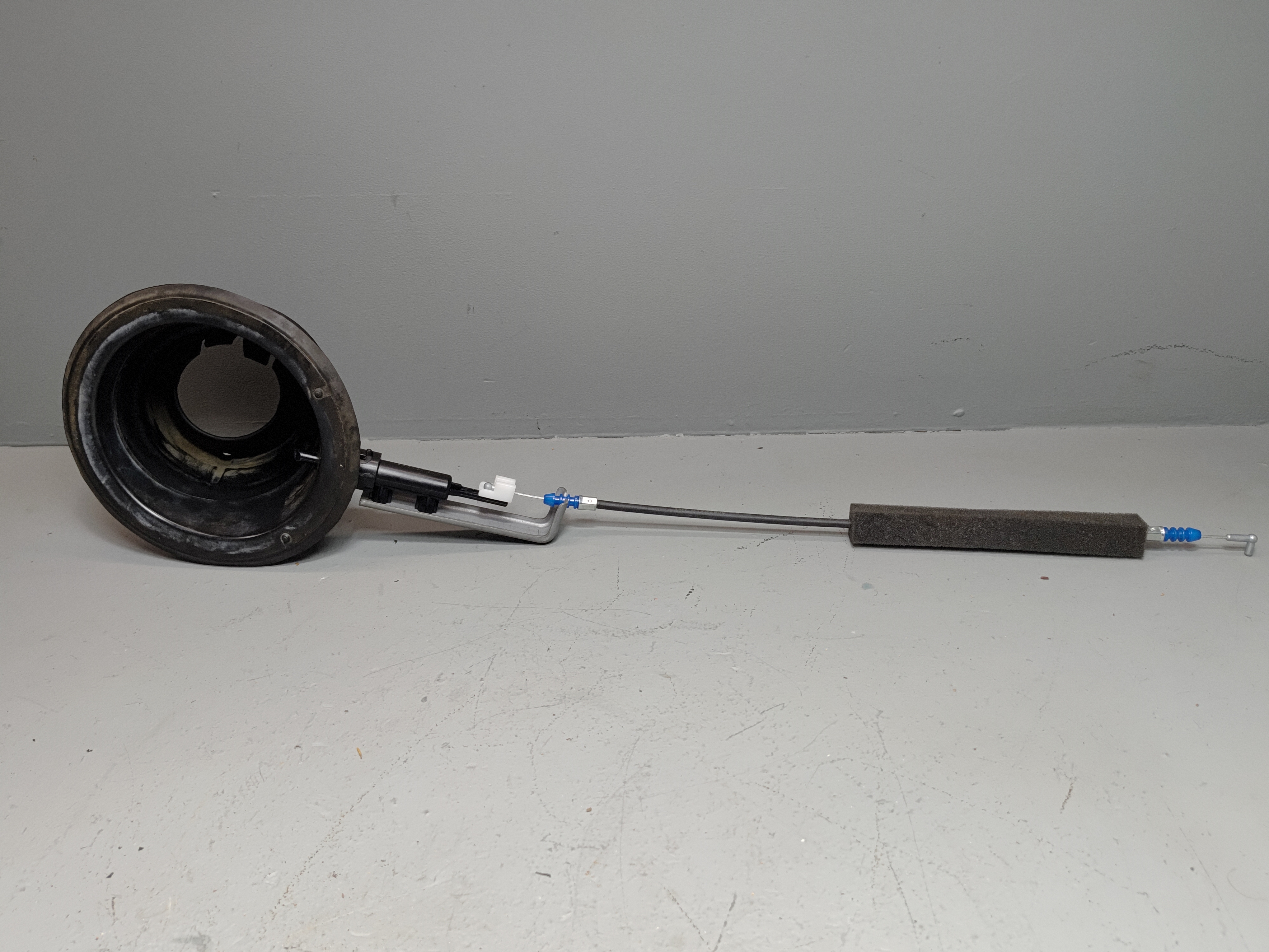 2016-2022 HONDA PILOT FUEL TANK DOOR LID LOCK LATCH ACTUATOR CABLE POCKET OEM