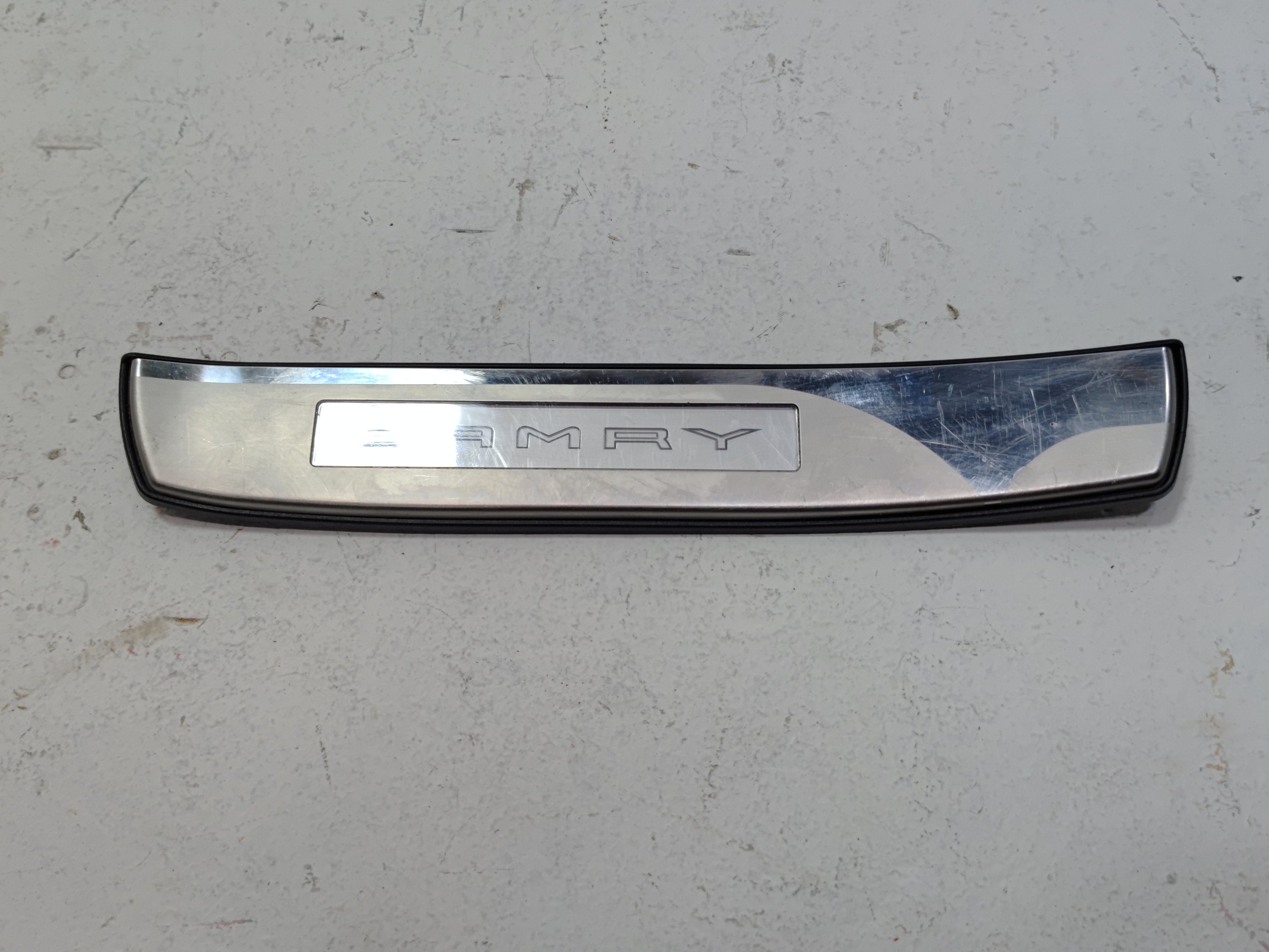 2018-2024 TOYOTA CAMRY REAR LEFT DRIVER SIDE DOOR LOWER SILL SCUFF PLATE OEM